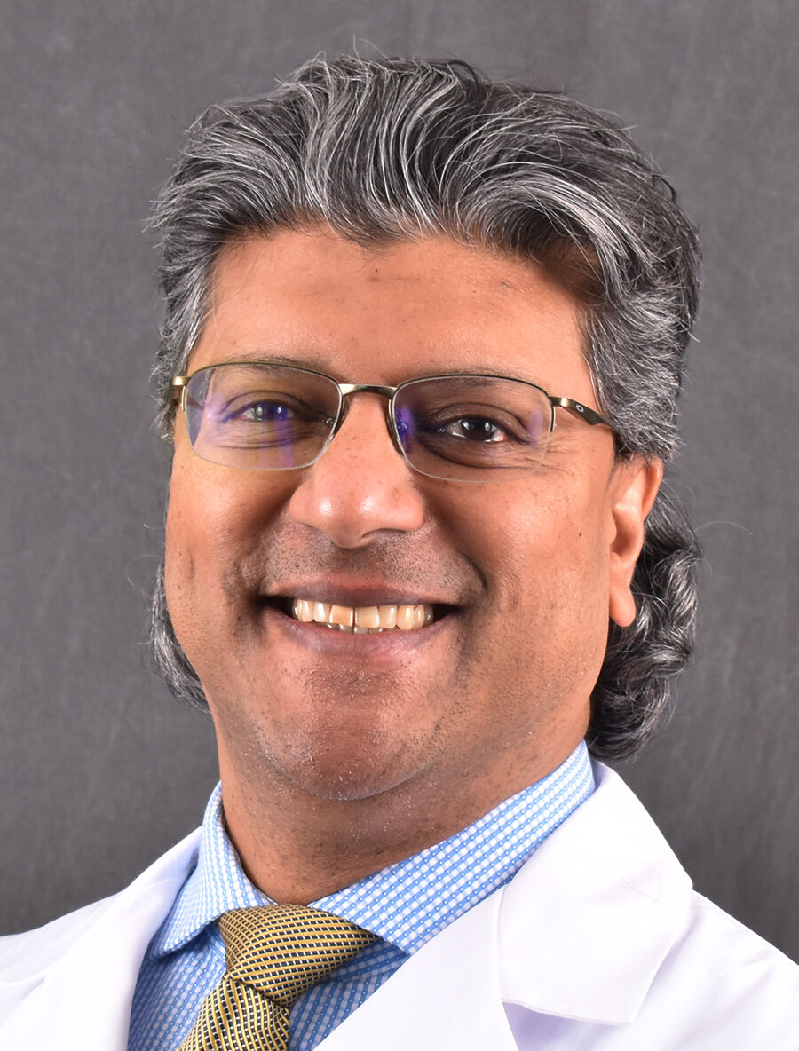 Dr. Devanand Dominique